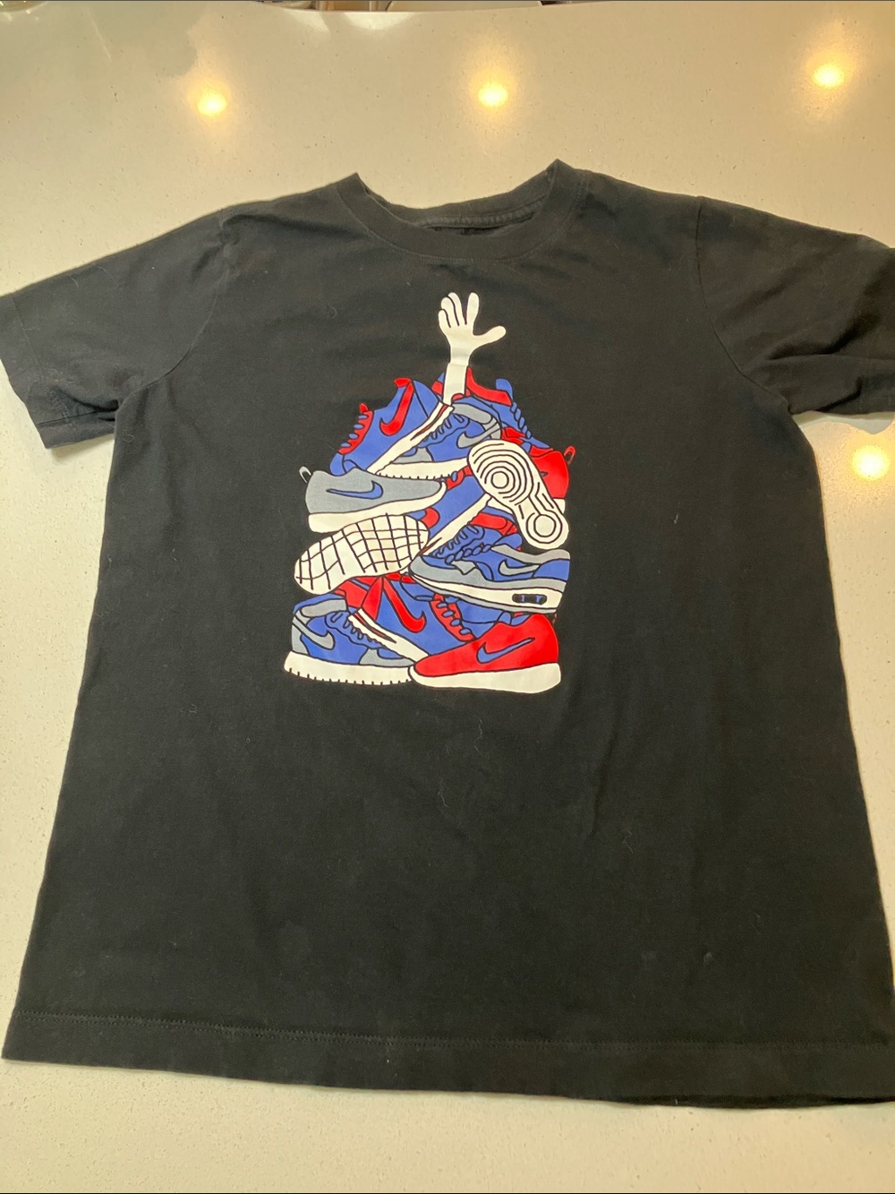 Nike Black Tee with Red & Blue Sneaker Stack Graphic